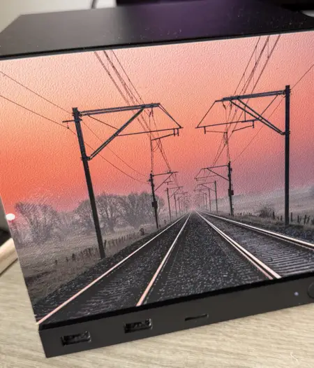 A railway photo printed on a textured faceplate, on the Steam Machine