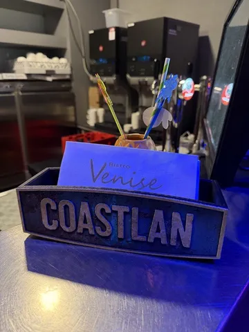 COASTLAN menu holder at the LAN party bistro